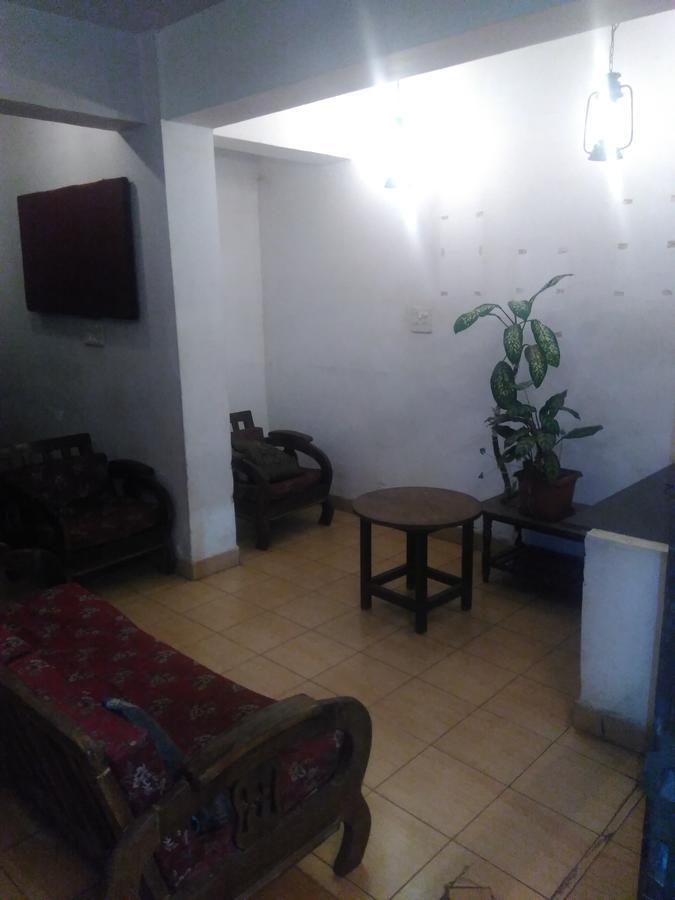 Hôtel Palm Grove à Cavelossim Extérieur photo