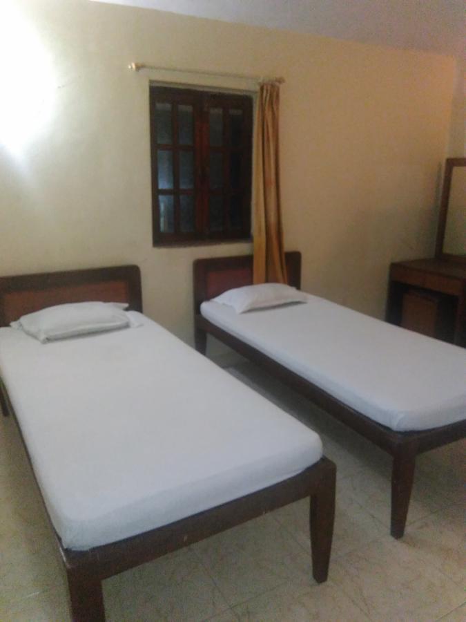 Hôtel Palm Grove à Cavelossim Extérieur photo